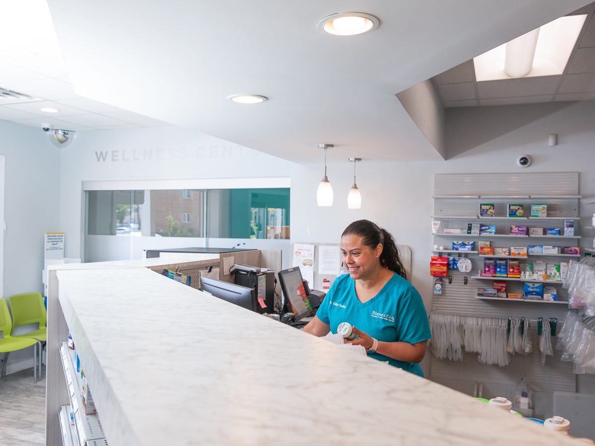 Pharmacist at the counter of the Hawthorne Health community site in Lindenwold, New Jersey